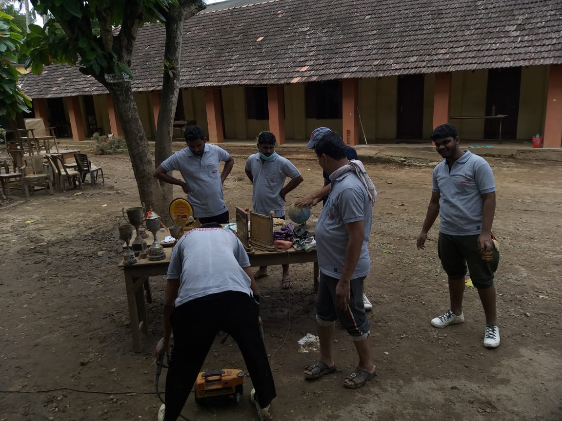 Dr. K. P. Hussain Charitable trust team doing cleaning work at Wayanad flood area.