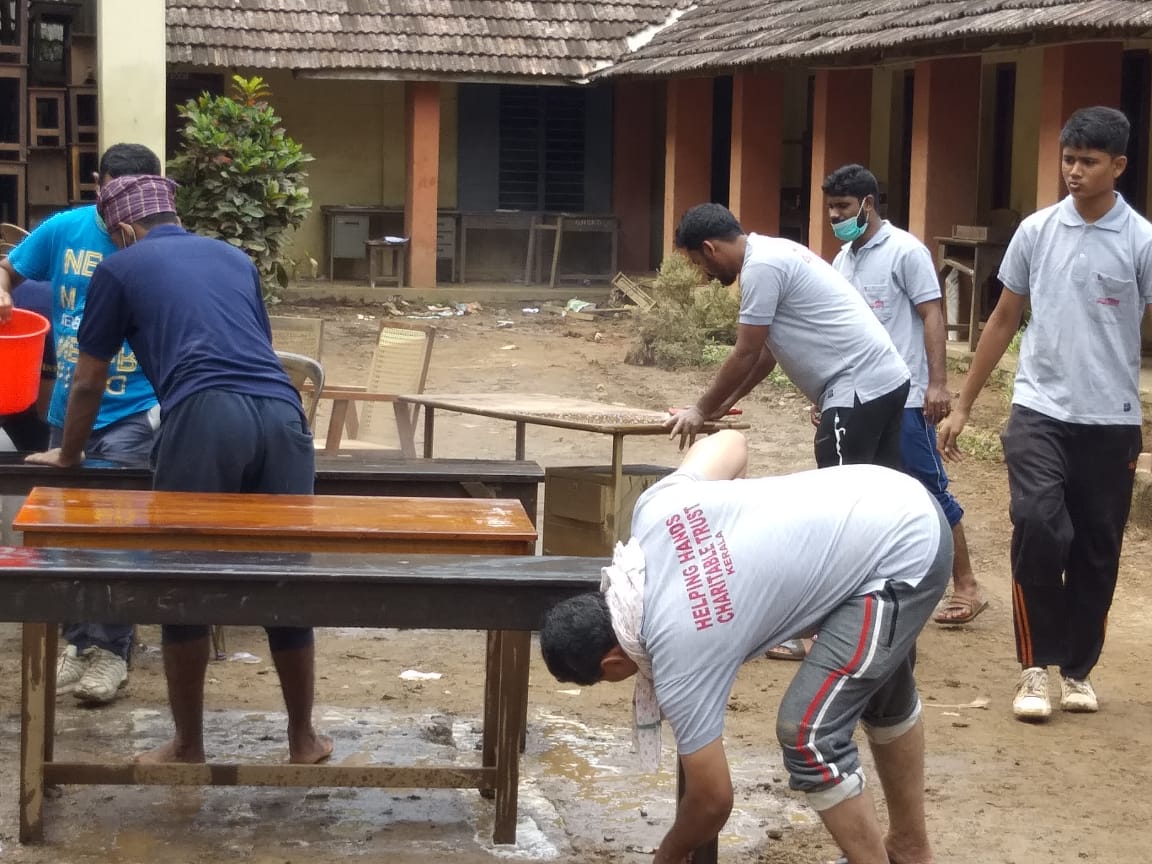 Dr. K. P. Hussain Charitable trust team doing cleaning work at Wayanad flood area.
